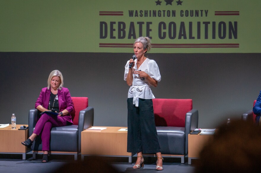 Incumbent candidate Dannielle Larkin, right, gives her opening statement to start the St. George City Council debate on Nov. 1, 2023. She has been the target of a smear campaign that has defaced her signs and left notes around town tying her to controversial drag shows.