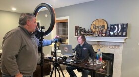 Mark Rucker with co-host Matt Hughes in their basement podcast studio