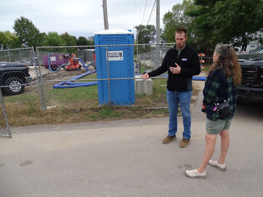 Lee Donahue confers with engineer Alex Jaromin at the Town of Campbell municipal well site. Jaromin's part of a team that's been working on the project from the beginning.