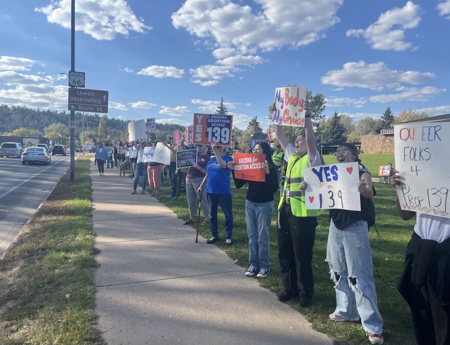Supporters of Proposition 139 rallied outside Flagstaff City Hall on Sunday, Oct. 13, 2024.