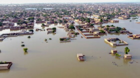 This aerial view shows a flooded residential area after heavy monsoon rains in Balochistan province on Aug. 29, 2022. (Fida Hussain/AFP via Getty Images)