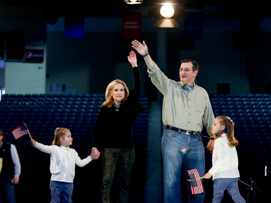 Sen. Ted Cruz, his wife, Heidi, and their two daughters Catherine (left) and Caroline practice waving on stage at Liberty University before Cruz's Monday presidential campaign launch.