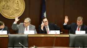 South Carolina Rep. Bill Whitmire, R-Walhalla, left, House Speaker Jay Lucas, R-Hartsville, center, and Rep. Kirkman Finlay, R-Columbia, right, vote during a meeting of the College and University Trustee Screening Commission on Tuesday, March, 30, 2022, in Columbia, S.C. (AP Photo/Jeffrey Collins).