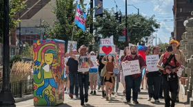 Demonstrators rally in downtown Dayton, calling for an end to anti-trans legislation in the Ohio Statehouse.