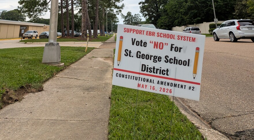 A sign outside the East Baton Rouge Parish School System office opposes Amendment 2, which would create a separate school district for the new city of St. George, on May 11, 2026.