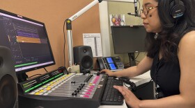 Elayna Cunningham, a college student interning at Koahnic Broadcast Corp., records a program on July 10, 2025, at the Anchorage, Alaska, studios of KNBA, the flagship station for National Native News.