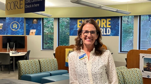 Angela Snyder, Augustana's first assistant vice president for impact learning, in the lobby of Olin Center on the Rock Island campus, Thursday, Oct. 22, 2026.