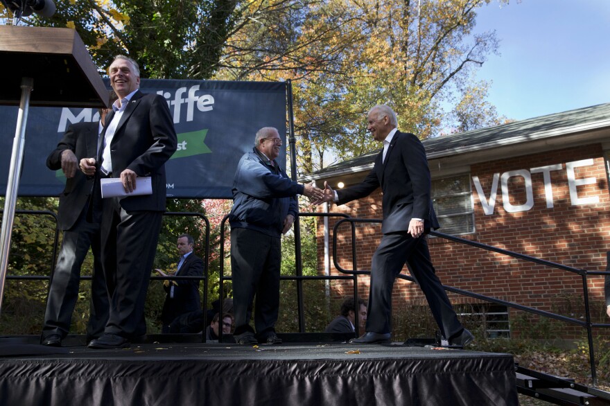 Vice President Biden is greeted by Rep. Gerald Connolly, D-Va., before speaking at a backyard rally for Virginia Democratic gubernatorial candidate Terry McAuliffe on Monday.