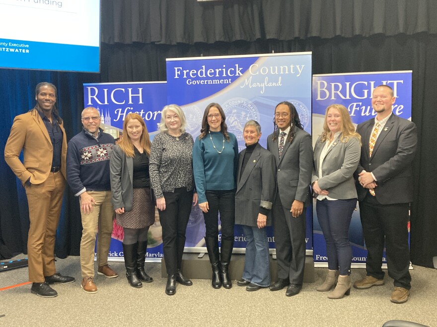 Frederick County Executive Jessica Fitzwater (center), joined by county and city officials.