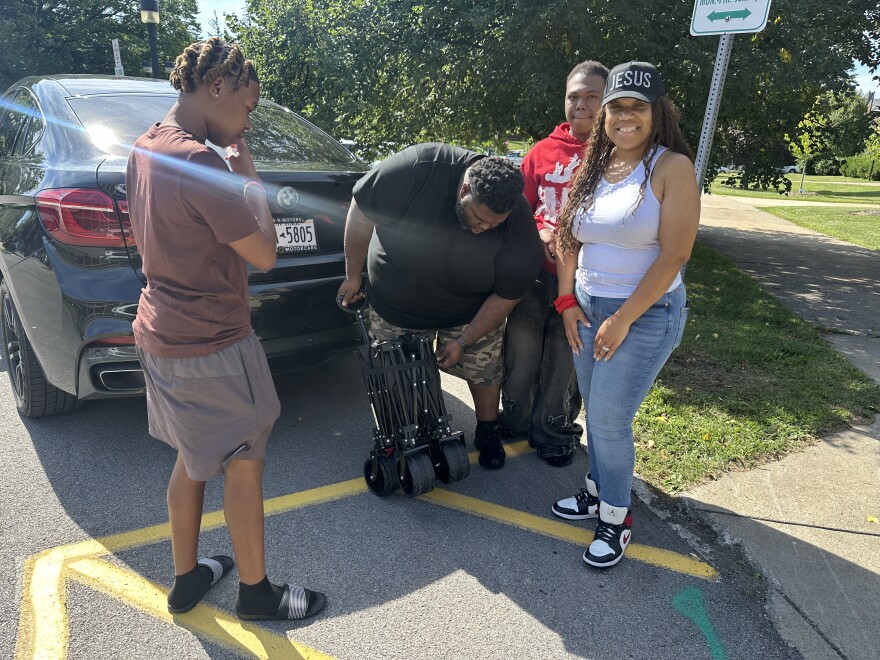 Freshman Olivia Young, who traveled from Brooklyn, NY, with her family, is moving in on campus at Buffalo State University.