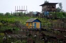 Construction is visible in an area known as Nova Conquista or New Conquest where families are building houses near the center of Oiapoque, Amapa state, Brazil, Wednesday, March 11, 2026. (AP Photo/Eraldo Peres)