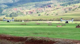 FILE - Two MV-22 Ospreys, from Marine Corps Base Hawaiʻi, land at a rally point in the Mākua Military Reservation during a joint training event on Oʻahu, Hawaiʻi, Dec. 10, 2021.