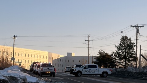 Police close off a section of the Chief Eddie Hoffman Highway in Bethel after a man was shot by a police officer in the early morning hours of March 25, 2026.