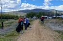 Volunteers help pick up trash on the Rail Trail in Wanship during the Trails, Trash and Tunes event.