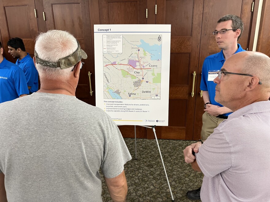 Residents discuss one of the concepts proposed by the state DOT at Thursday's public "scoping session."