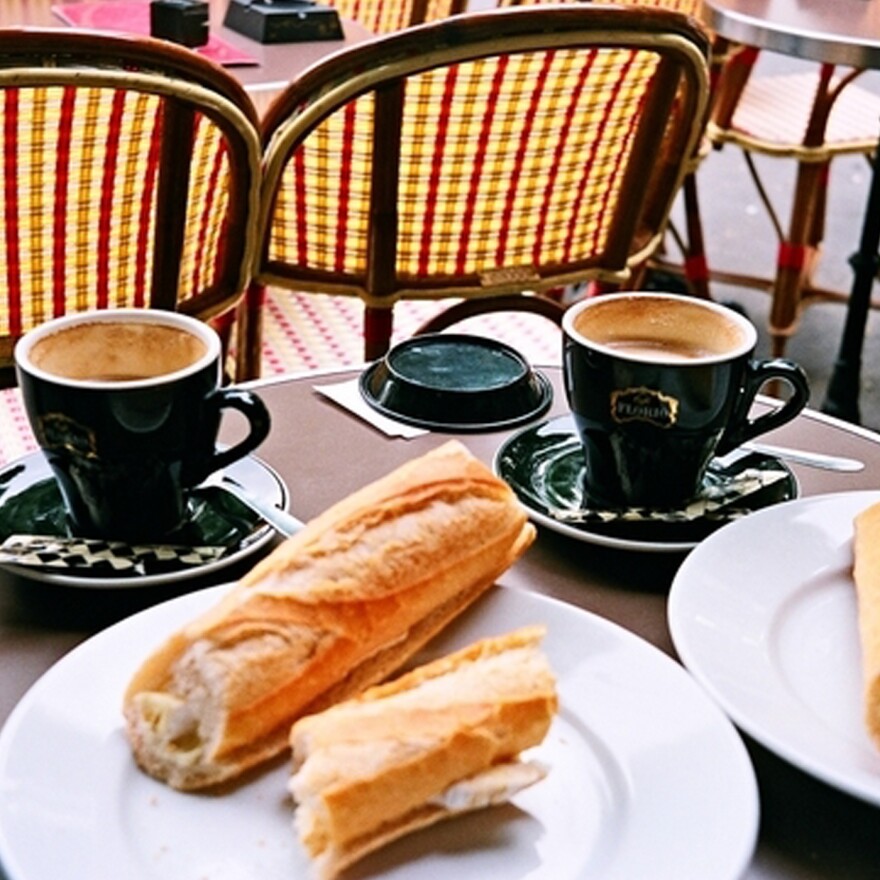 Baguettes and coffee outside cafe