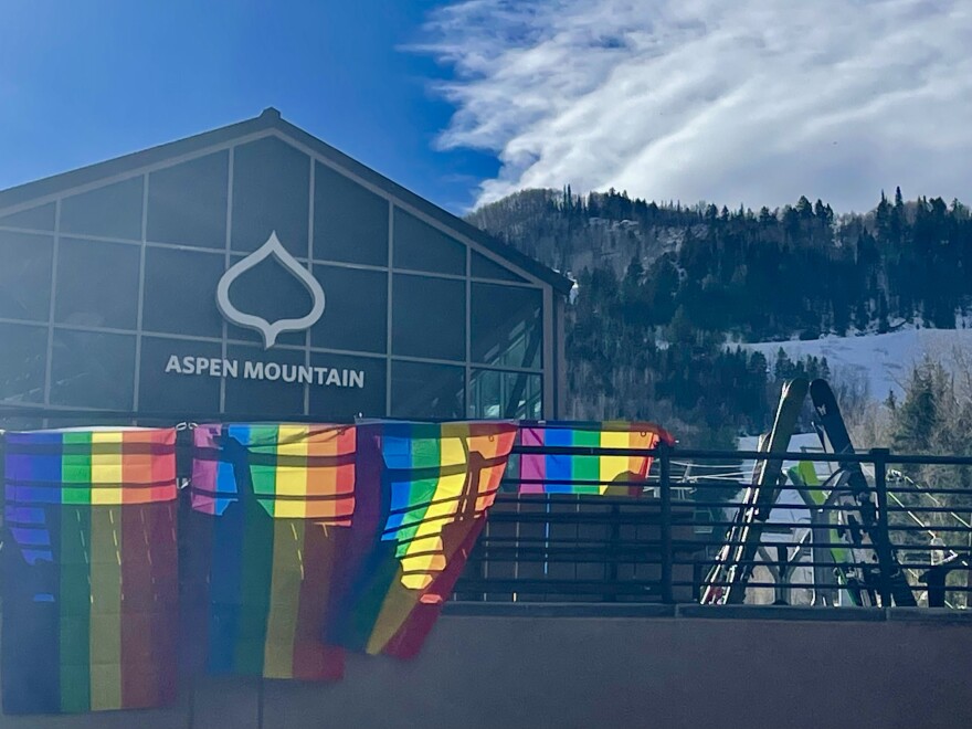 Rainbow pride flags hang at the base of Aspen Mountain on in honor of the lives lost at an LGBTQ nightclub over the weekend.