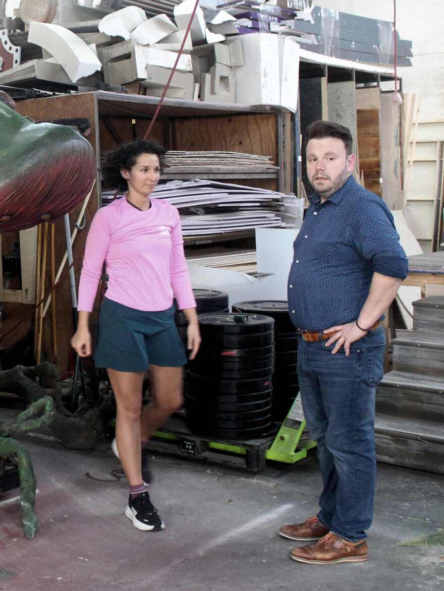 Cassidy Stoner (Audrey) confers with Director Jason Parrish about the best way for Noah Berry to place her in Audrey II's mouth.