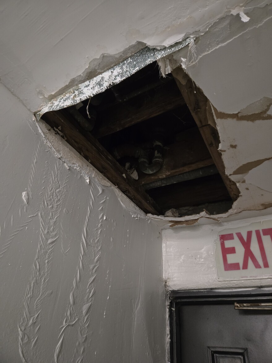 A hole in a hallway ceiling at Hank Heideman's apartment complex