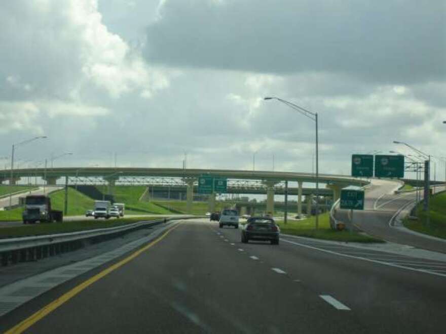 FDOT is placing blue and white signs near all 64 rest areas to show drivers where they can pull over to text and make calls.  Photo: Wikimedia Commons.