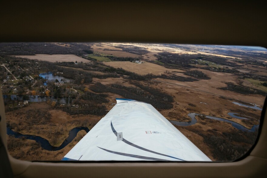 An aerial view from an airplane window. A four-seater plane nicknamed ‘Buzz’ takes flight over the Chicago suburbs as part of a network of volunteer pilots and their aircraft. 