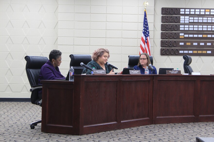 Judith Barba Perez, center, speaks alongside fellow Tulsa Public Schools board members Jennettie Marshall, left, and Susan Lamkin during TPS' board meeting Monday, Jan. 9, 2022, at the district's service center.