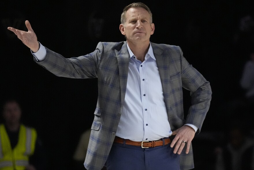 Alabama head coach Nate Oates looks onto the court during the first half of an NCAA college basketball game against Vanderbilt, Saturday, Jan. 6, 2024 in Nashville, Tenn. (AP Photo/George Walker IV)