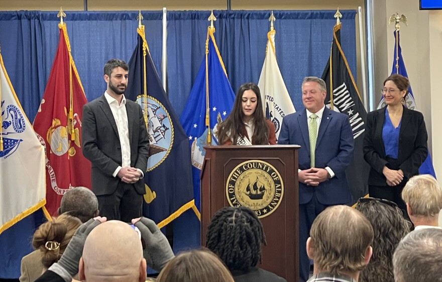 Olivia Rose speaking at the Albany County Executive Office