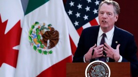 U.S. Trade Representative Robert Lighthizer speaks Dec. 10 in Mexico City during an event to sign an updated trade agreement between the U.S., Canada and Mexico. It was just one development in a week that exposed deep cracks in the global trading system.