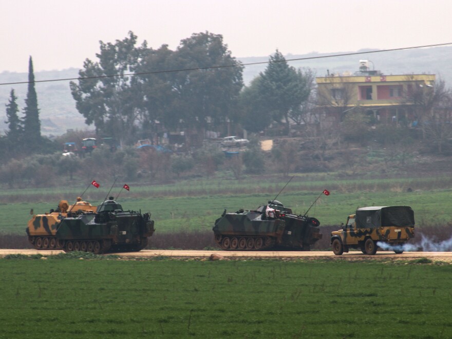 Turkish military tanks are prepared for deployment as part of the "Operation Olive Branch" to the Syrian border in Hatay, Turkey, on Thursday.