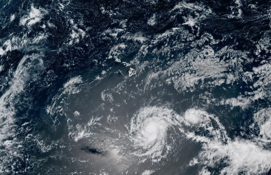 Hurricane Iona and Tropical Storm Keli appear to be passing south of the Hawaiian Islands, as of 2 p.m. on July 28, 2025.