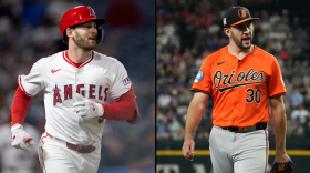 Left: Los Angeles Angels' Taylor Ward runs the bases after hitting a home run during the ninth inning of a baseball game against the Kansas City Royals Sept. 23, 2025, in Anaheim, Calif. (AP Photo/Eric Thayer, File)
Right: Baltimore Orioles starting pitcher Grayson Rodriguez walks off the field after pitching in the third inning of a baseball game Saturday, July 20, 2024, in Arlington, Texas. (AP Photo/Jeffrey McWhorter)