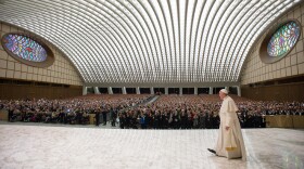 Pope Francis arrives for a special audience with the members of the UCIIM Catholic union of Italian secondary school teachers, in the Pope Paul VI hall, at the Vatican on Saturday.