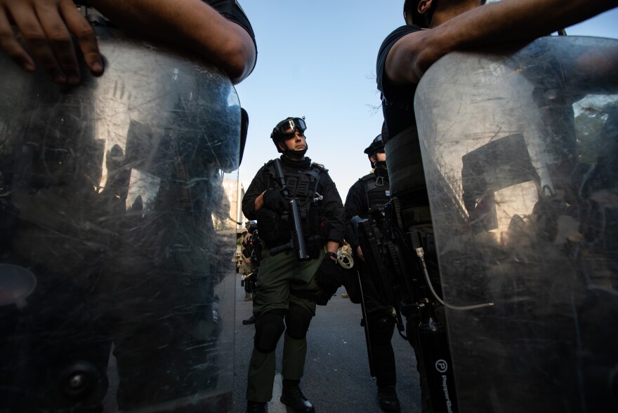 "The military and law enforcement presence is overwhelming," NPR journalist Alana Wise said in a tweet, who was on the ground near the White House.