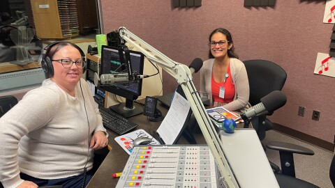 KCCU Station Manager Amanda Purser with Cancer Centers of SW OK Oncology Program Manager Angelina Baker.