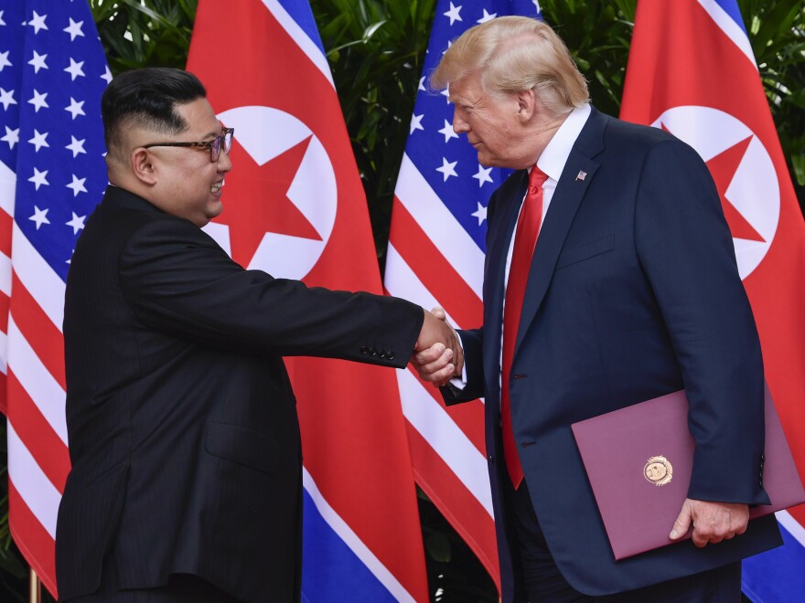 North Korea leader Kim Jong Un and President Trump shake hands at the conclusion of their meetings at the Capella resort on Sentosa Island, in Singapore, on June 12.
