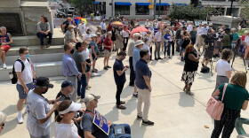 Redistricting reform advocates rallied outside the Statehouse ahead of a legislative hearing.