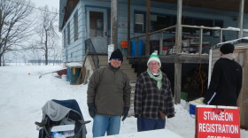 Rebecca Klaper (right) with postdoctoral student Gusatvo Dominguez collecting tissue for genomics research at a sturgeon spearing site in 2015.