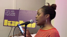 E Okobi performing Black Skin Baby