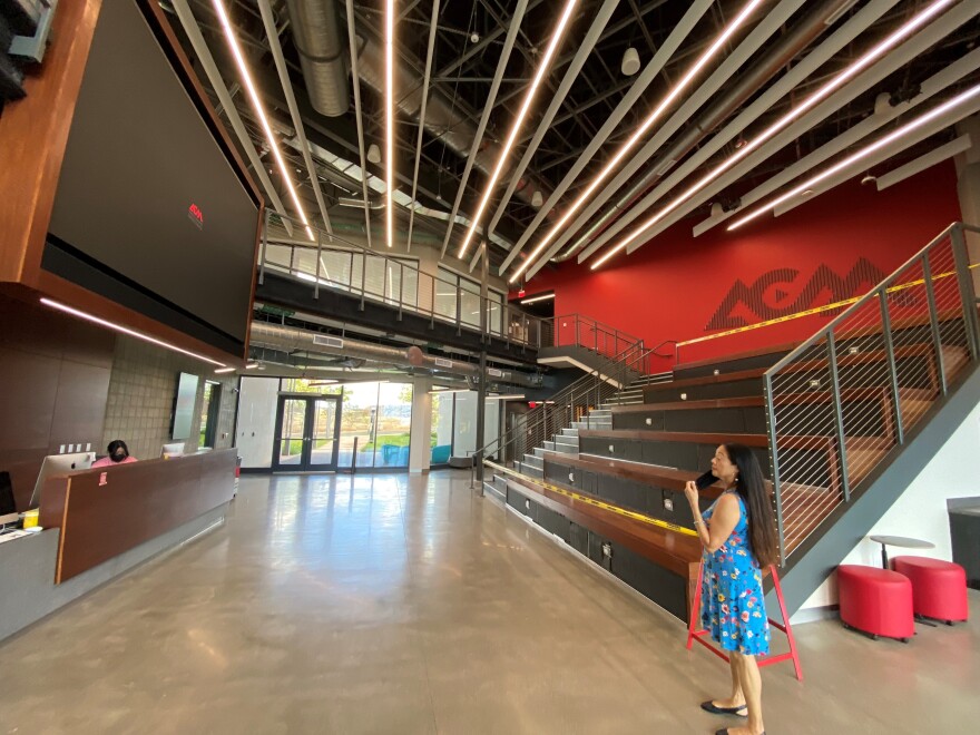 UH West Oahu Chancellor Maenette Benham gives a tour of the school's new Academy for Creative Media facility. The facility houses state of the art equipment in film and media production.