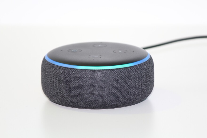 An Amazon Echo on a white background.