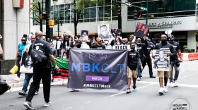 Boys in My Brother's Keeper Charlotte Mecklenburg marched in uptown Charlotte last June during a Black Men Matter rally.