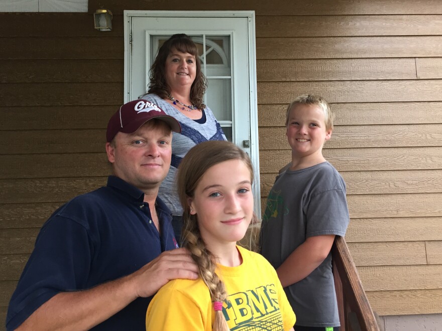 Marti and Kevin Murphy at home with their children