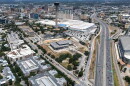 An aerial image shows downtown San Antonio, the Hemisfair area, I-37 and parts of the Alamodome and East Side. The Institute of Texan Cultures, shown in the foreground, was undergoing demolition when this image was taken in 2025.
