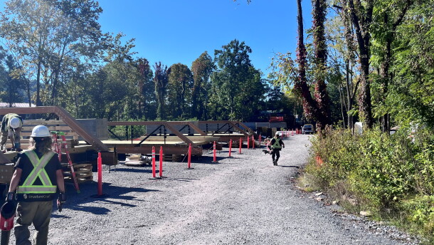 Kiewit workers are working on a site along the Virginia Creeper Trail outside Damascus.