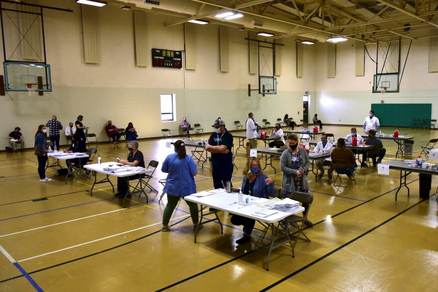 A COVID-19 vaccination clinic in Elkhart. Many Hoosiers should expect long waits to get a COVID-19 vaccine when they become eligible to schedule appointments next week.