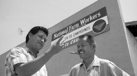 United Farm Workers leader Cesar Chavez, left, who led the fight as head of the AFL-CIO union local, talks with Larry Itliong, leader of the Filipino Agriculture Workers Organizing Committee, in front of union headquarters at Delano, Calif., July 28, 1967.