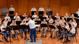 Sergeant First Class Chad Bratton conducts the 145th Army Band at the Oklahoma Summer Arts Institute's June 24 concert.