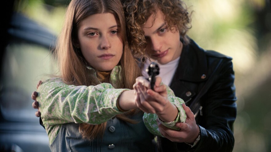 Carlos (Lorezno Ferro) and Marisol (Malena Villa) take aim in <em>El Angel</em>.