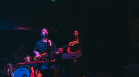 Two men performing on stage